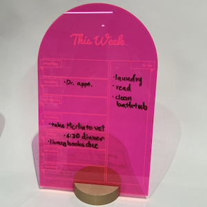 acrylic shape with erasable to-dos written on it